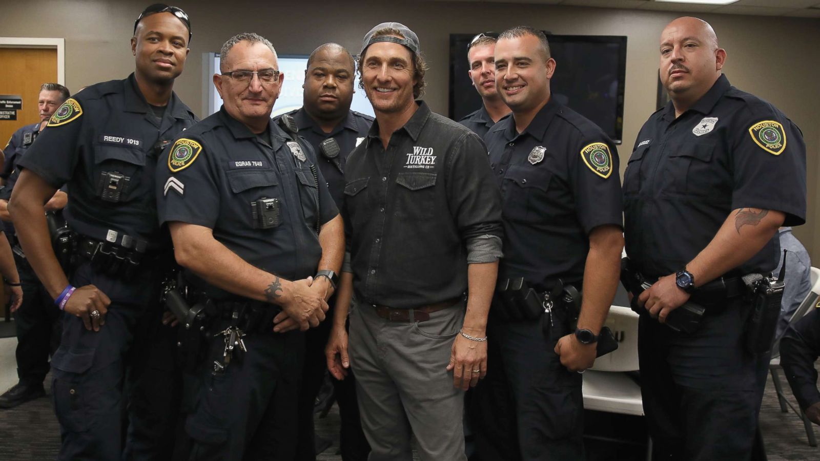 PHOTO: Matthew McConaughey takes photos with Houston's Police Department officers during Wild Turkey gives back 2018 with Matthew McConaughey, Oct. 28, 2018, in Houston, Texas.