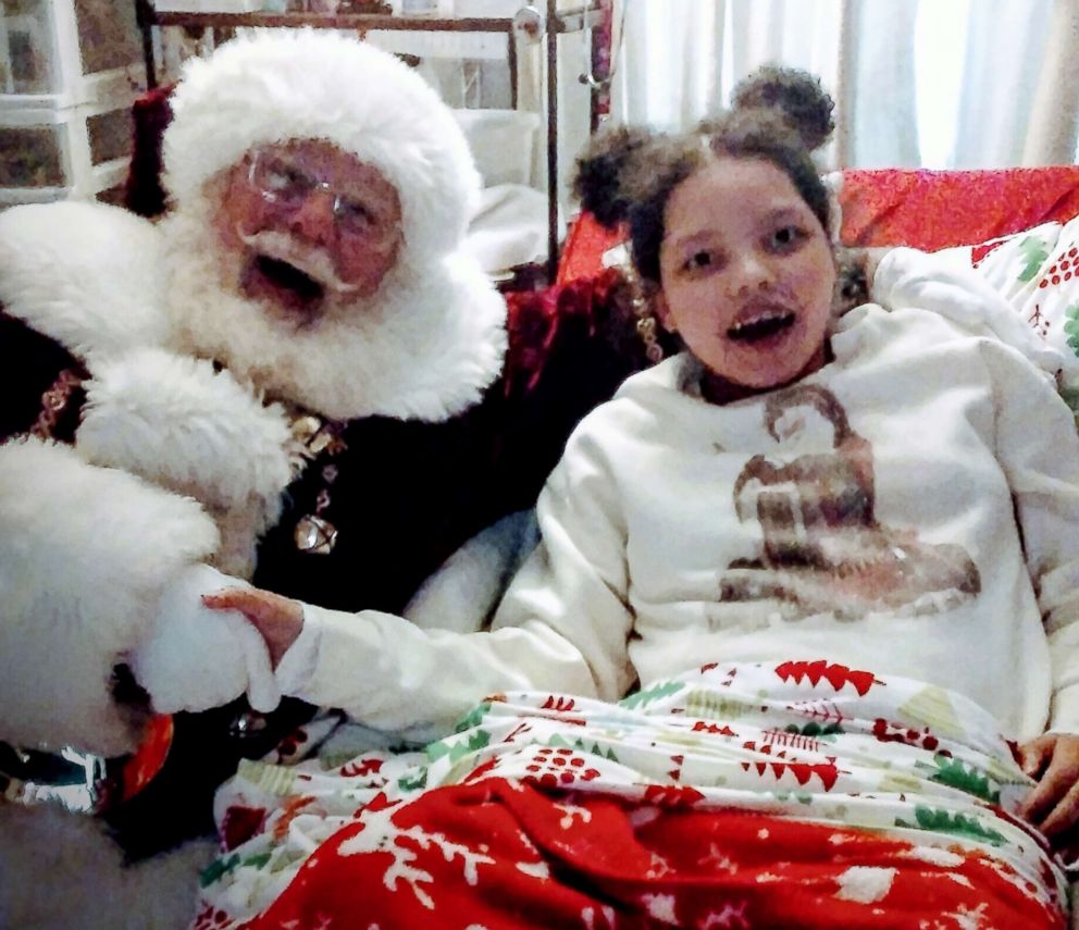 PHOTO: Maudake Morris visits with Santa in 2017.