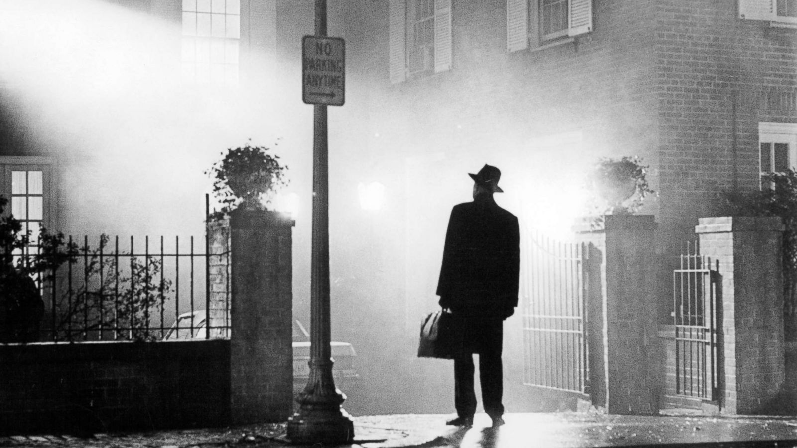 PHOTO: Max Von Sydow stands in front of home in yard entrance in a scene from the film 'The Exorcist,' 1973.