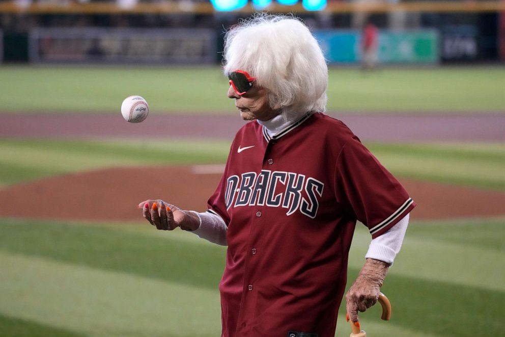 PHOTO: In this July 24, 2022, file photo, former All American Girls Professional Baseball player Maybelle Blair appears before a baseball game between the Arizona Diamondbacks and the Washington Nationals, in Phoenix.