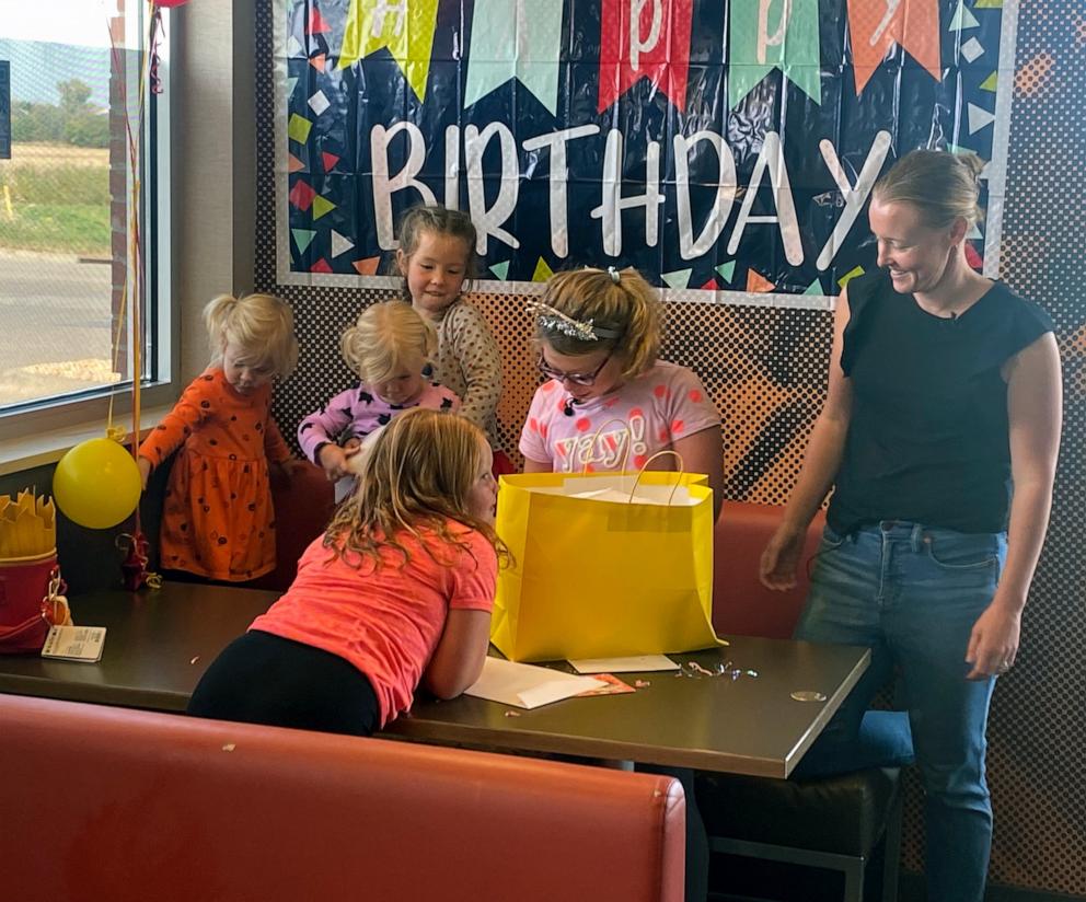 PHOTO: Eleanor with her mom Clare Evenson (right) and cousins at her McDonald’s birthday party.