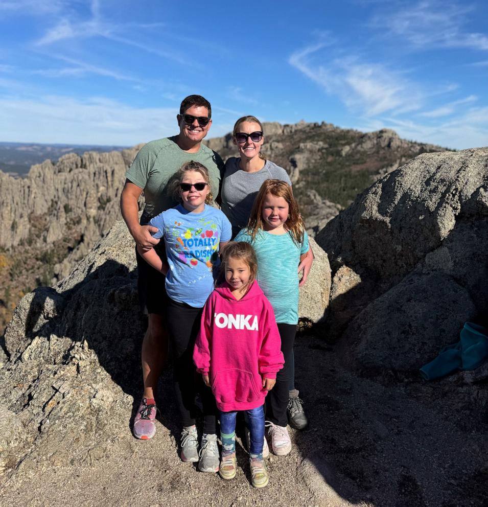 PHOTO: Eric and Clare Evenson with their three daughters, including Eleanor.