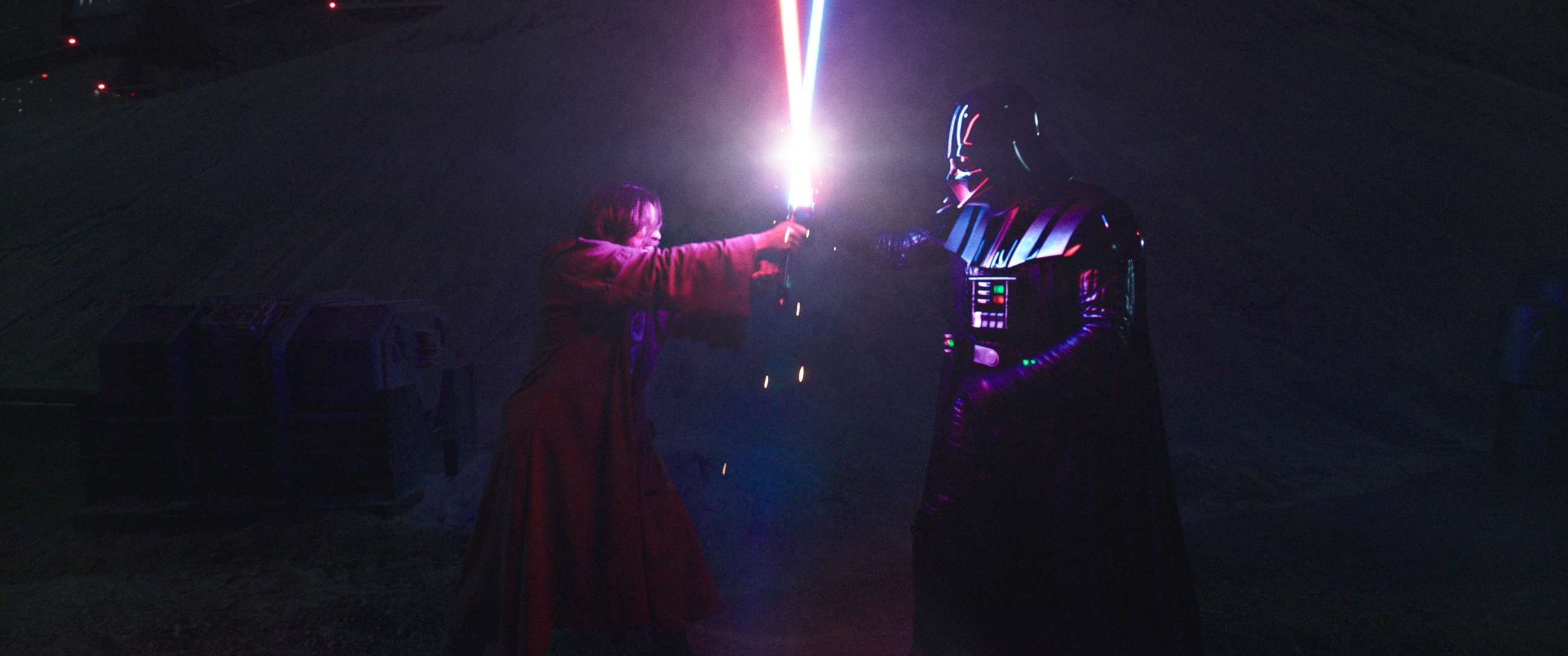 PHOTO: Obi-Wan Kenobi (Ewan McGregor) and Darth Vader (Hayden Christensen) clash lightsabers in "Obi-Wan Kenobi" on Disney+.