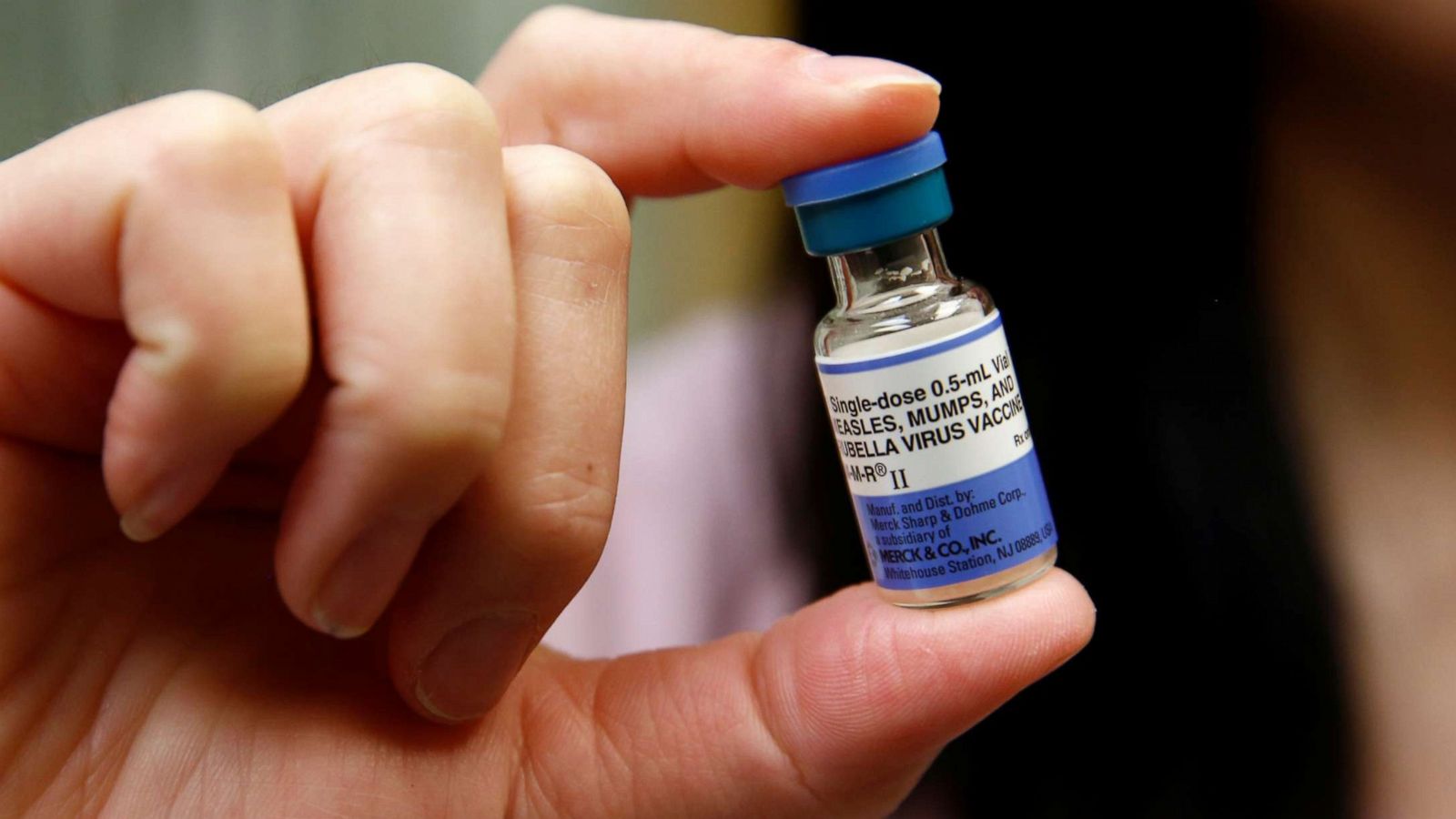 PHOTO: A medical assistant at the International Community Health Services clinic in Seattle holds a vial of the measles, mumps, and rubella virus vaccine o March 20, 2019.