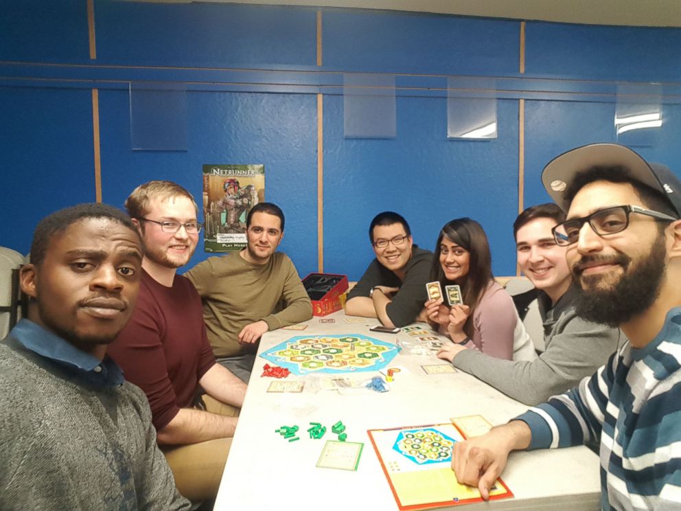 PHOTO: The MeetUp.com group "Hey Siri How Do I Make New Friends After College" is pictured playing a boardgame in an undated handout image.