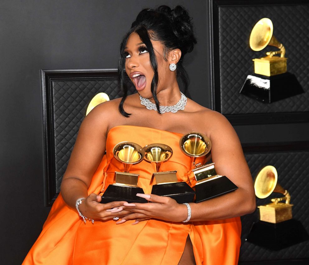 PHOTO: Megan Thee Stallion, winner of the Best Rap Performance and Best Rap Song awards for 'Savage' and the Best New Artist award, poses at the Grammy Awards, March 14, 2021, in Los Angeles.