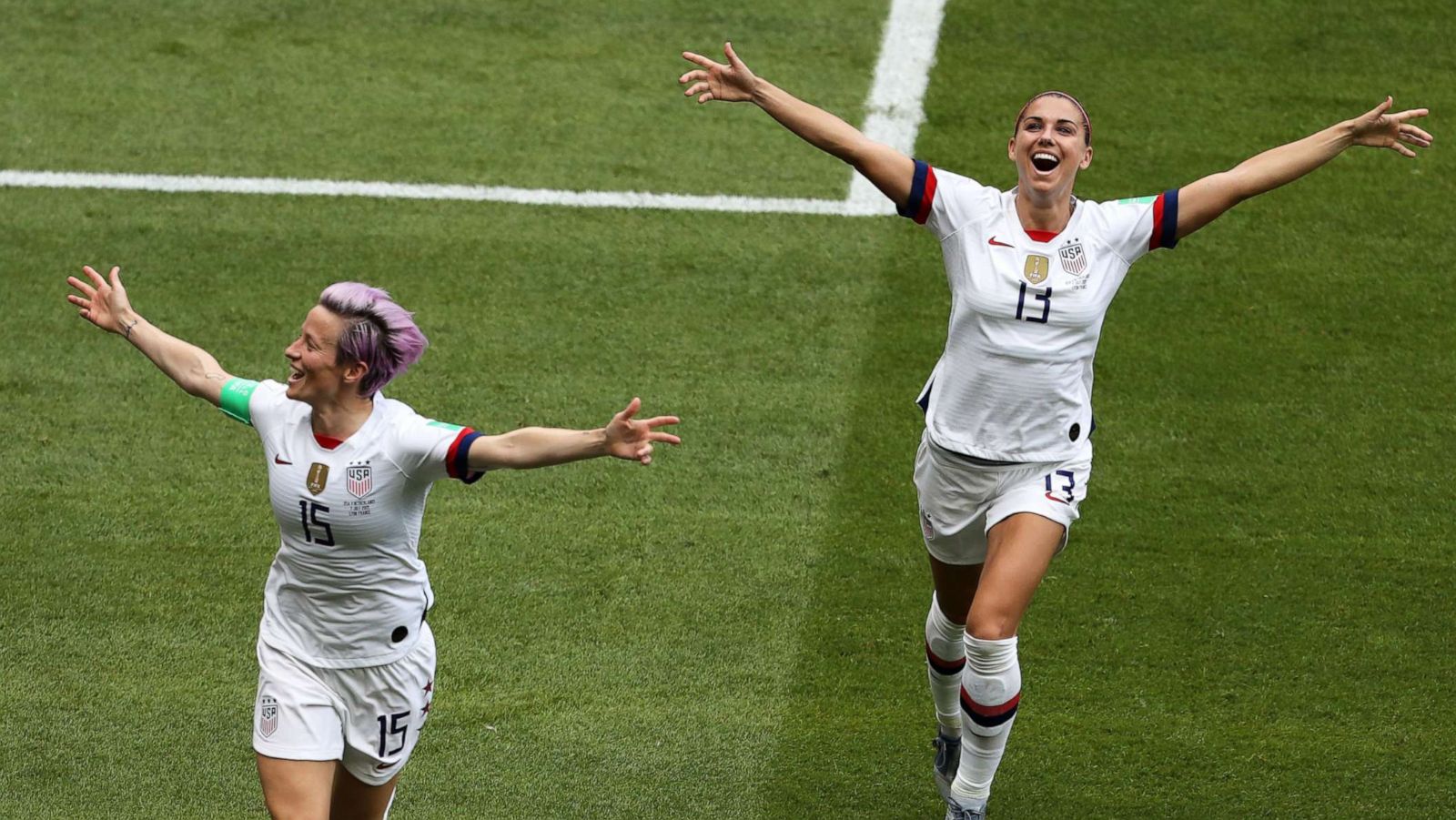 PHOTO: Megan Rapinoe of the U.S. celebrates with teammate Alex Morgan after scoring her team's first goal during the 2019 FIFA Women's World Cup France Final match, July 7, 2019 in Lyon, France.