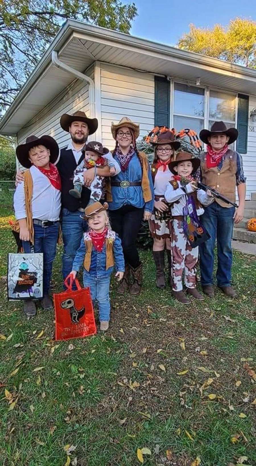 PHOTO: Megan and Michael Richards pose with their kids on Oct. 31, 2021, just weeks before Megan died due to COVID-19.