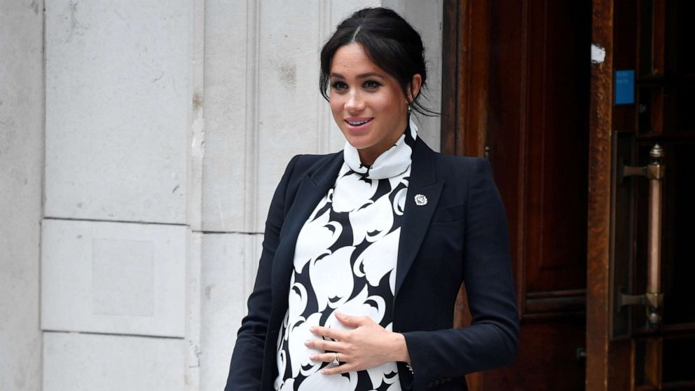 PHOTO: Meghan, Duchess of Sussex, leaves after an International Women's Day panel discussion at King's College London, March 8, 2019. 