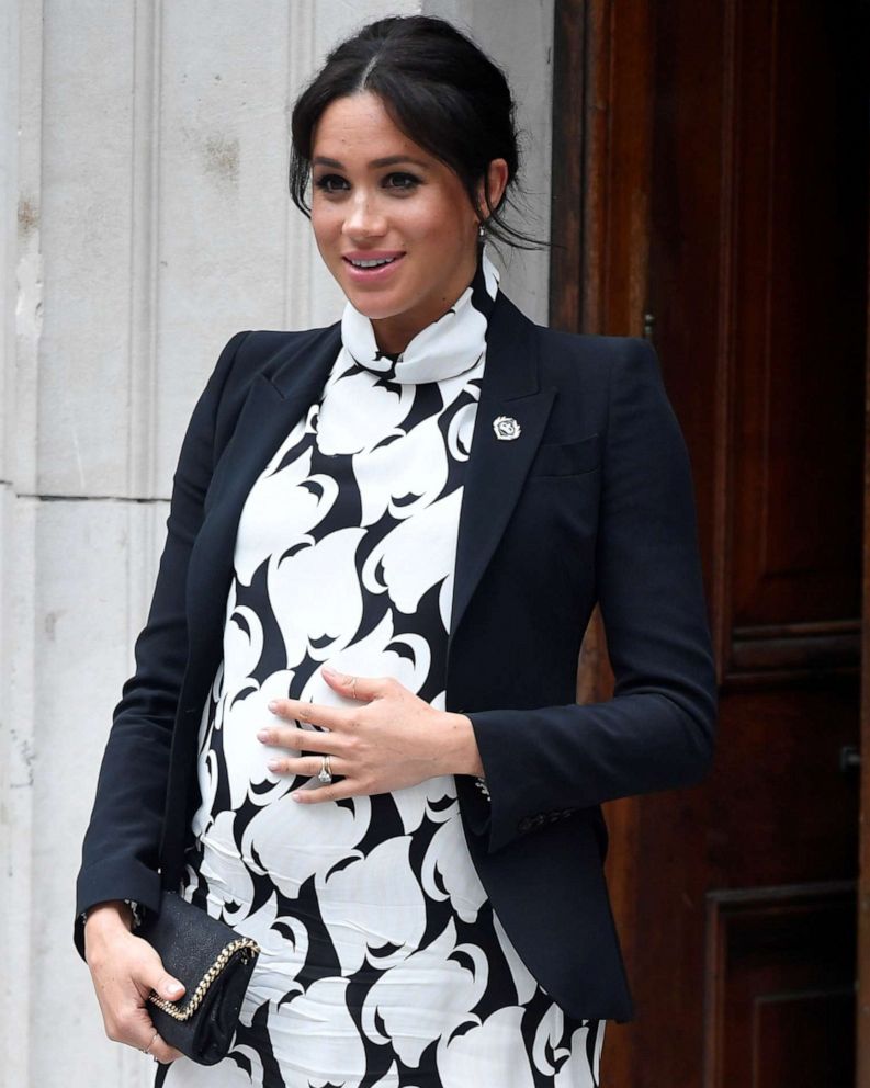 PHOTO: Meghan, Duchess of Sussex, leaves after an International Women's Day panel discussion at King's College London, March 8, 2019. 