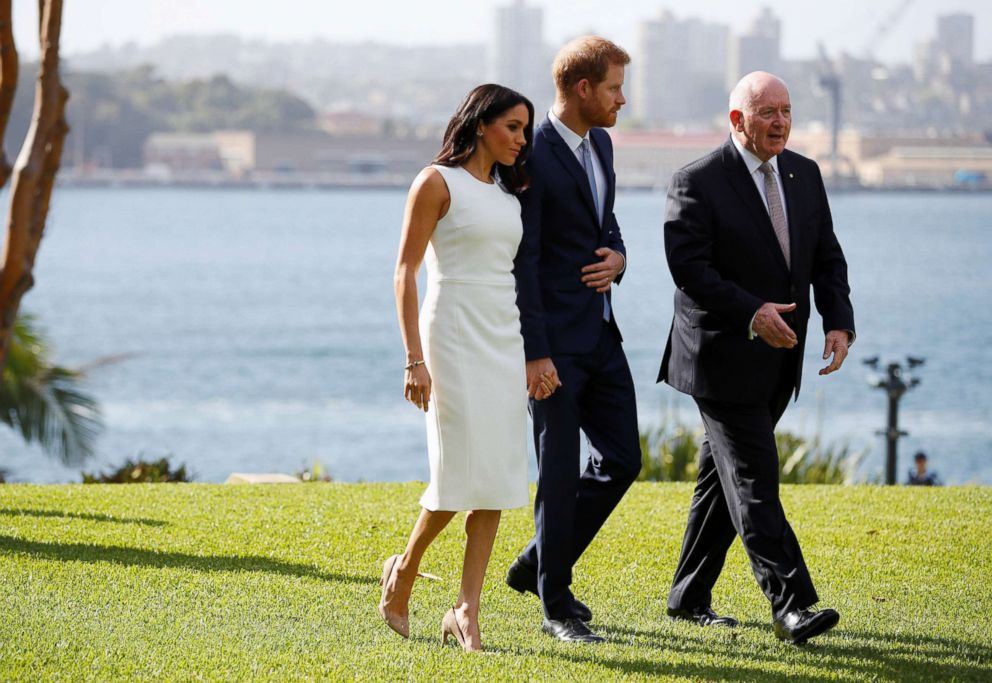 PHOTO: Prince Harry, Duke of Sussex and Meghan, Duchess of Sussex walk with Australia's Governor General Peter Cosgrove at Admiralty House on Oct. 16, 2018 in Sydney.