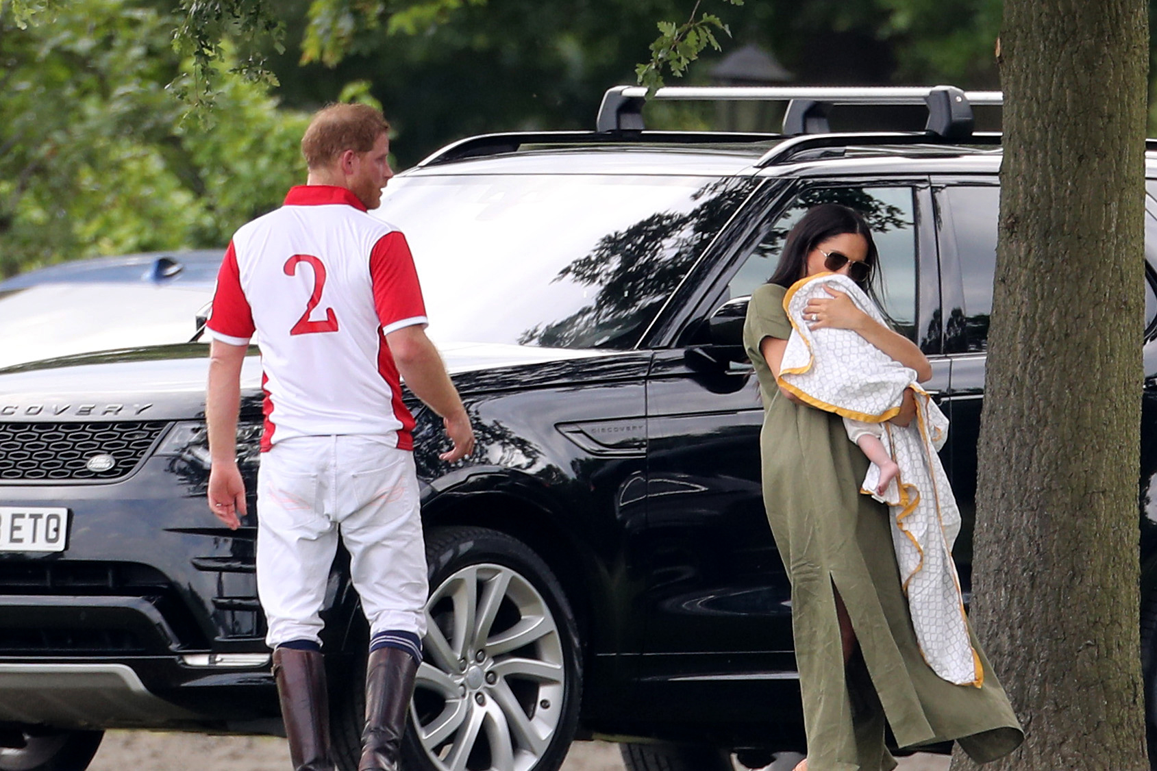 PHOTO: Prince Harry, Duke of Sussex, Meghan, Duchess of Sussex and Prince Archie Harrison Mountbatten-Windsor attend The King Power Royal Charity Polo Day at Billingbear Polo Club, July 10, 2019, in Wokingham, England.