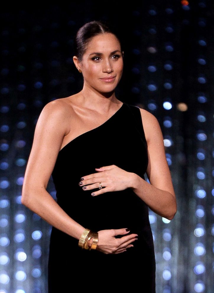 Meghan Markle's 6-Month Baby Bump Is on Full Display in Blush V-Neck Dress  by Brandon Maxwell