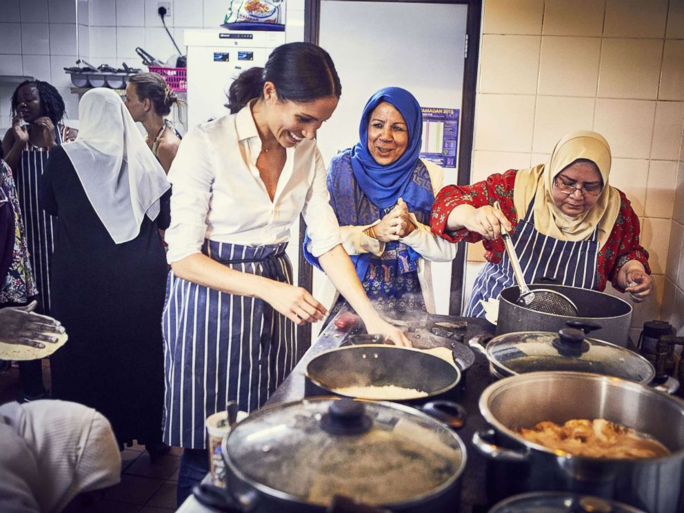 PHOTO: This undated picture released by Kensington Palace on September 17, 2018 shows Meghan Markle, Duchess of Sussex, cooking with women in the Hubb Community Kitchen at the Al Manaar Muslim Cultural Heritage Center, in the west of London.