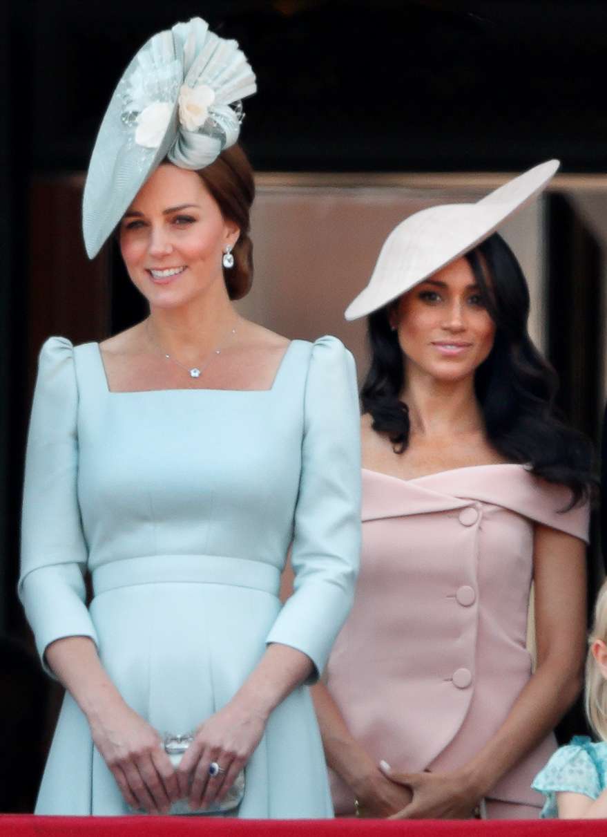 PHOTO: Catherine, Duchess of Cambridge and Meghan, Duchess of Sussex stand on the balcony of Buckingham Palace during Trooping The Colour 2018 on June 9, 2018 in London.