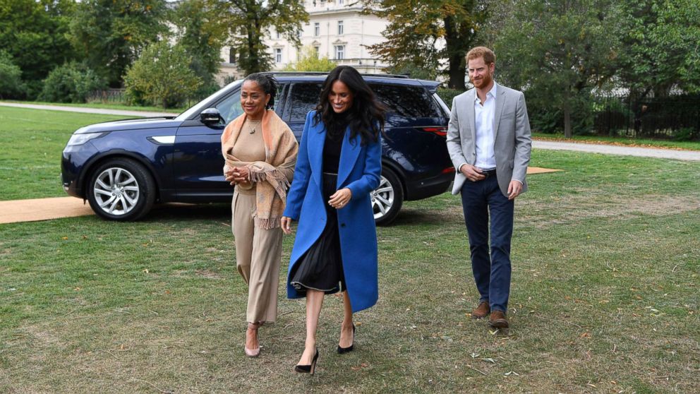 PHOTO: Meghan Markle, the Duchess of Sussex, accompanied by Britain's Prince Harry, the Duke of Sussex and her mother Doria Ragland walk to attend a reception at Kensington Palace, in London, Sept. 20, 2018.