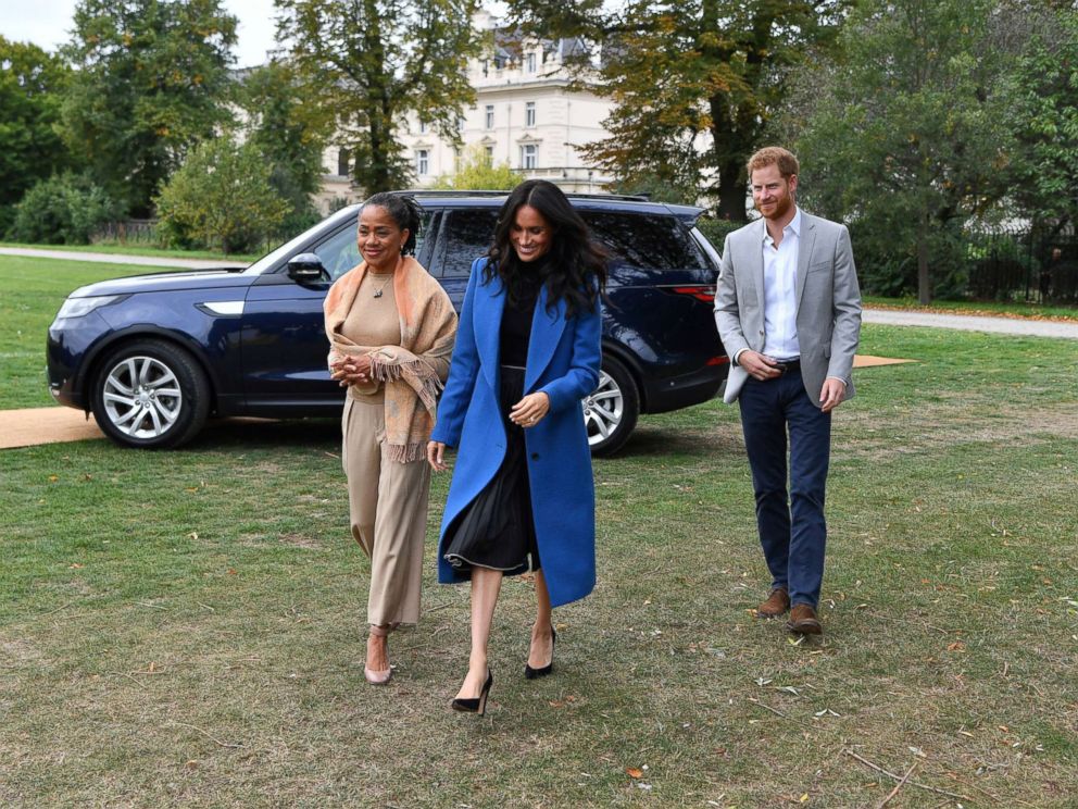 PHOTO: Meghan Markle, the Duchess of Sussex, accompanied by Britains Prince Harry, the Duke of Sussex and her mother Doria Ragland walk to attend a reception at Kensington Palace, in London, Sept. 20, 2018.