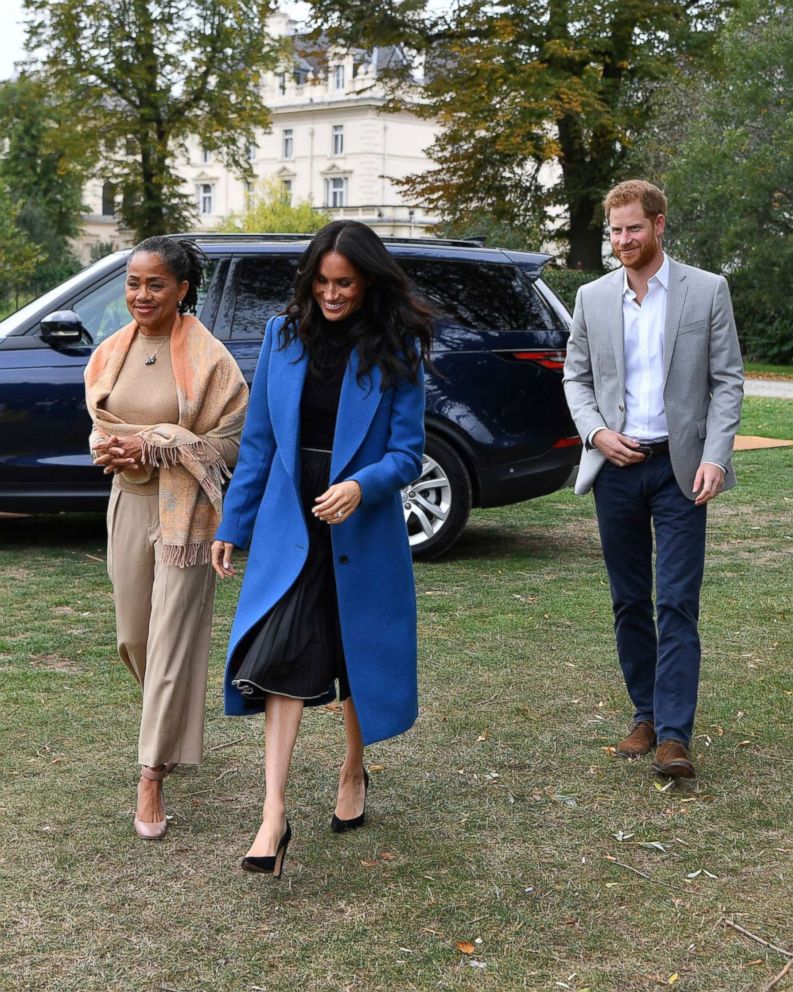 PHOTO: Meghan Markle, the Duchess of Sussex, accompanied by Britain's Prince Harry, the Duke of Sussex and her mother Doria Ragland walk to attend a reception at Kensington Palace, in London, Sept. 20, 2018.