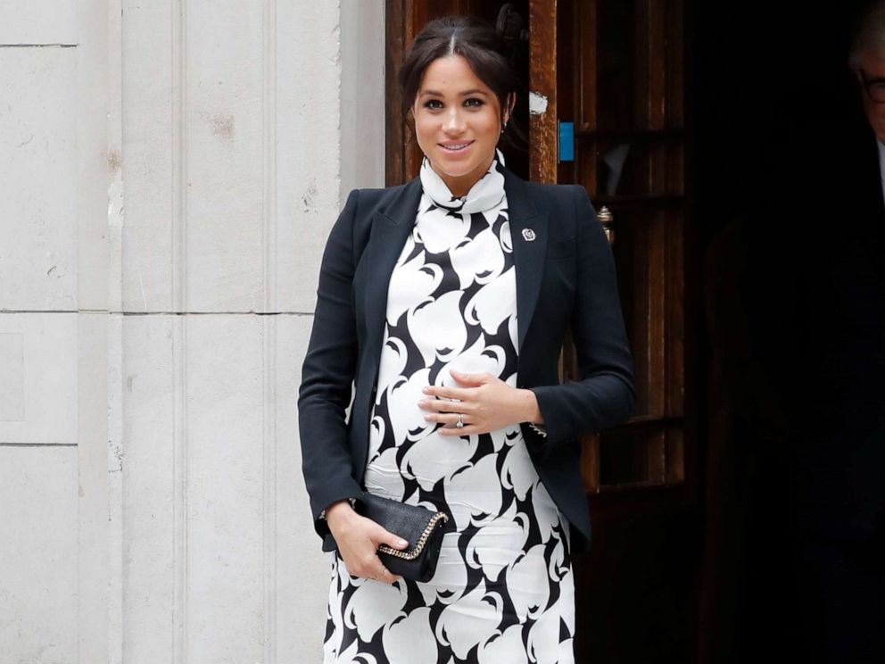 PHOTO: Britains Meghan, Duchess of Sussex leaves an event to mark International Womens Day in London on March 8, 2019.