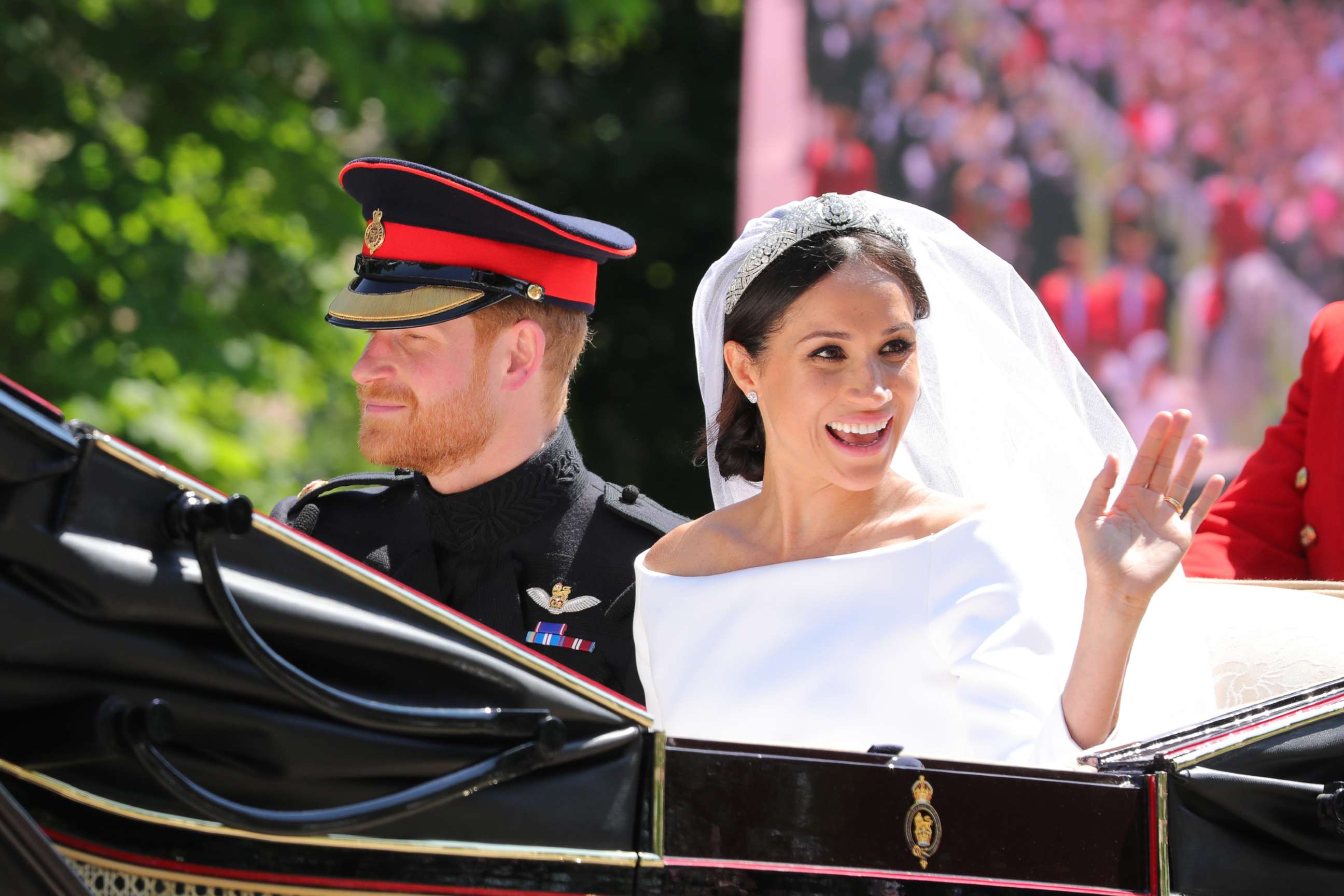 PHOTO: Prince Harry, Duke of Sussex and Meghan Markle, Duchess of Sussex leave Windsor Castle in the Ascot Landau carriage during the procession after getting married, Windsor Castle, May 19, 2018 in Windsor.