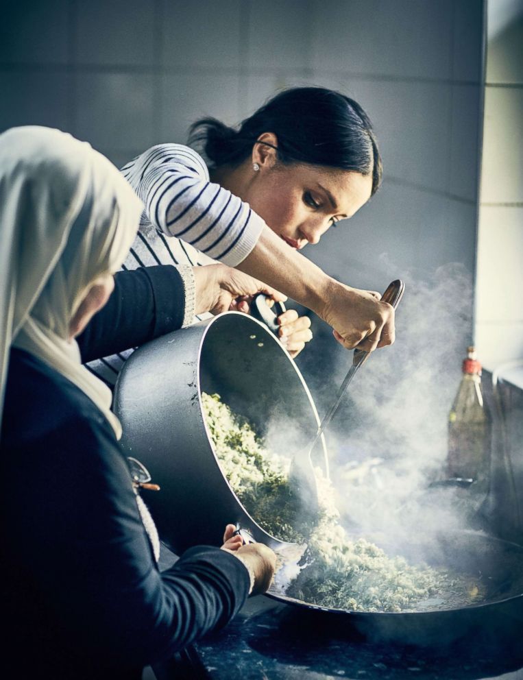 PHOTO: This undated picture released by Kensington Palace on September 17, 2018 shows Meghan Markle, Duchess of Sussex, cooking with women in the Hubb Community Kitchen at the Al Manaar Muslim Cultural Heritage Center, in the west of London.