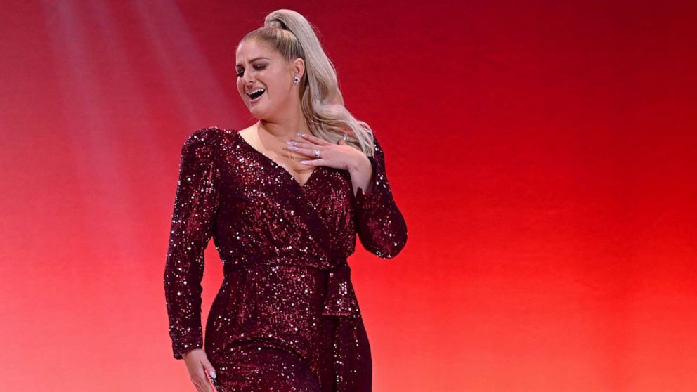 PHOTO: NEW YORK, NEW YORK - FEBRUARY 05: Meghan Trainor performs on the runway at The American Heart Association's Go Red For Women Red Dress Collection 2020 at Hammerstein Ballroom on February 05, 2020 in New York City.