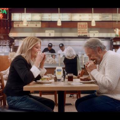 PHOTO: Meg Ryan and Billy Crystal reprise their roles as Sally and Harry at Katz's Deli for a new Hellmann's Super Bowl ad.