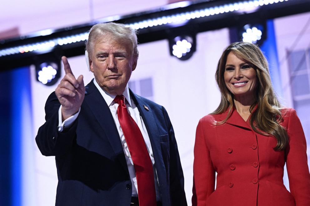 PHOTO: Former President and 2024 Republican presidential candidate Donald Trump stands next to Former First Lady Melania Trump onstage during the last day of the 2024 Republican National Convention in Milwaukee, July 18, 2024. 