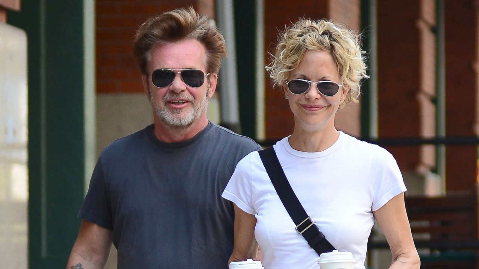 PHOTO: John Mellencamp and Meg Ryan are seen in Tribeca, June 24, 2013, in New York.