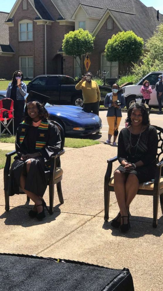 PHOTO: Gabrielle Pierce at the graduation sitting next to her mom, Natasha Burson.