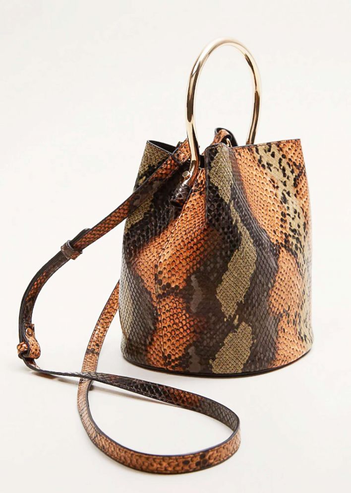 PHOTO: Style Hint: At first glance you may think this bold faux snakeskin bag should be worn with solid colors, but this fall is all about "maximalism." This bag will play well with other animal prints and plaids in the same color family.