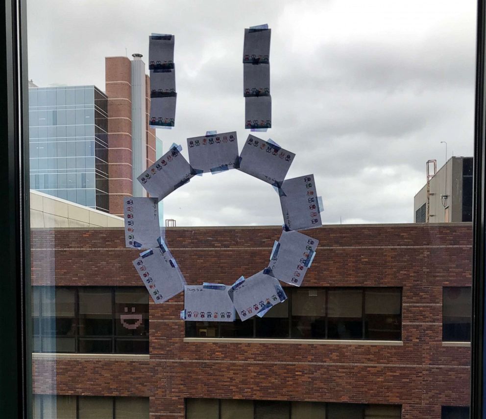 PHOTO: Meyer Mixdorf's Post-it Note art of a smiley face on the window of his hospital room at Children's Mercy Kansas City.