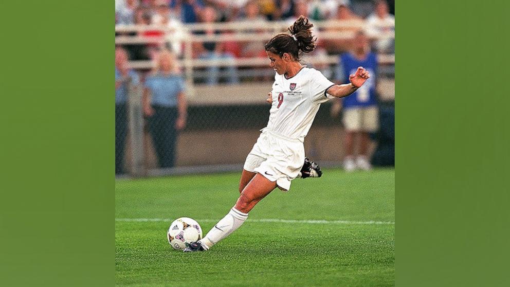 PHOTO: In this June 24, 1999, file photo, Mia Hamm of Team USA kicks the ball during the FIFA Women's World Cup game against Team Nigeria at Soldier Field in Chicago.