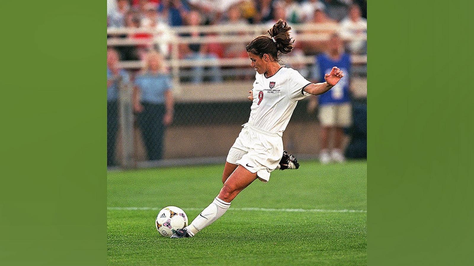 PHOTO: In this June 24, 1999, file photo, Mia Hamm of Team USA kicks the ball during the FIFA Women's World Cup game against Team Nigeria at Soldier Field in Chicago.