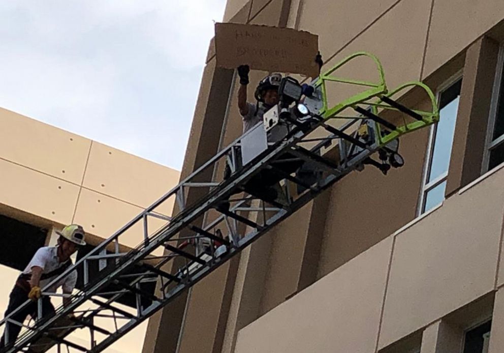 PHOTO: The Miami-Dade Fire Rescue squad used a station fire truck to visit a fellow lieutenant hospitalized in Miami-Dade County, Fla., April 3, 2020.