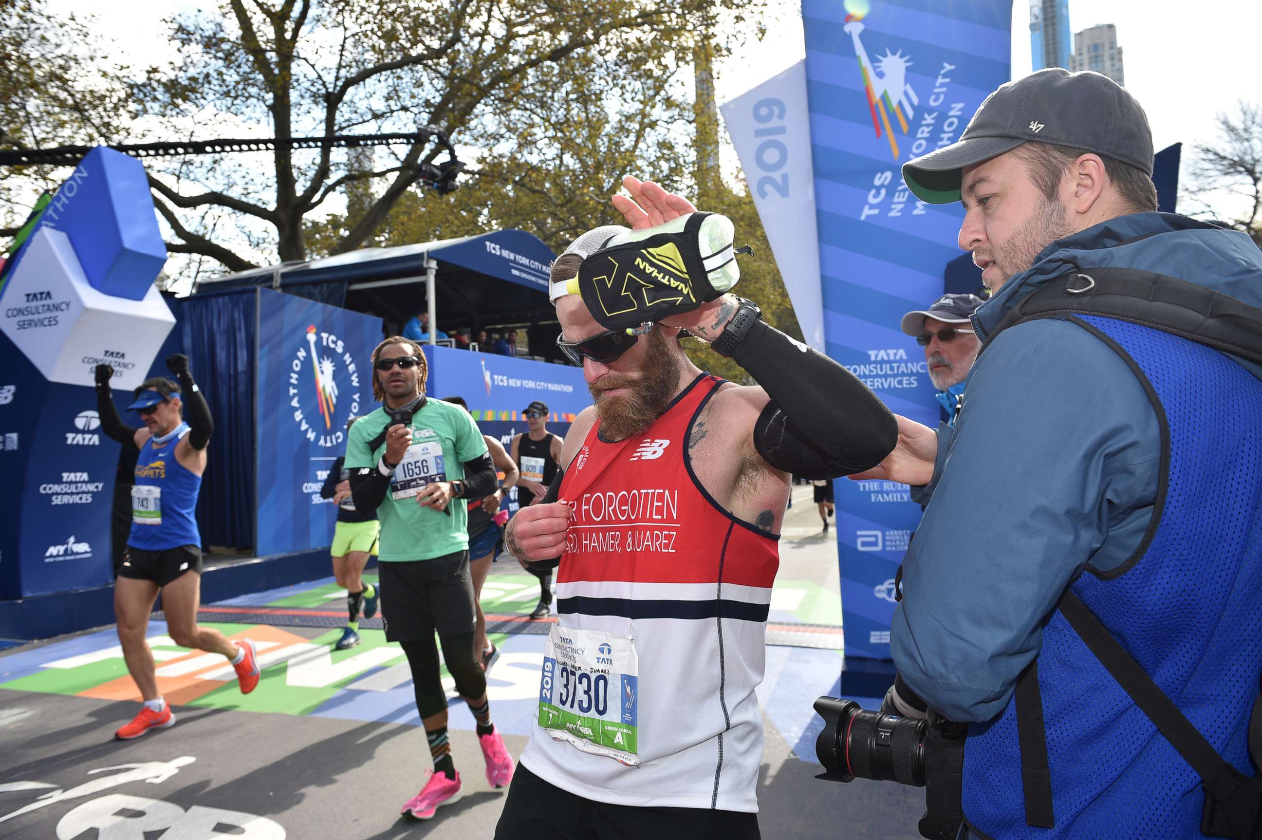 Marine vet stands tall at NYC Marathon after crawling to finish in