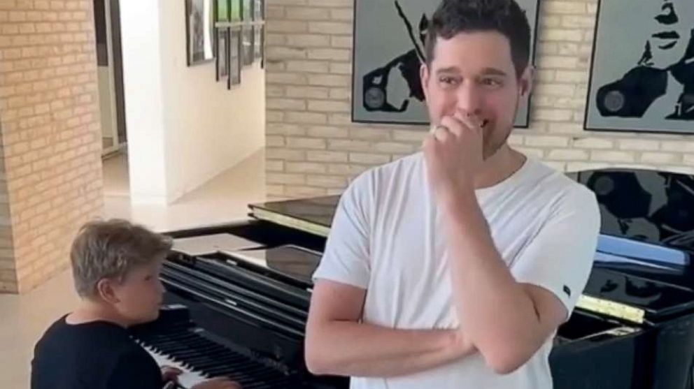 Watch Michael Buble fight back tears as son plays 'I'll Never Not Love You' on piano - ABC News