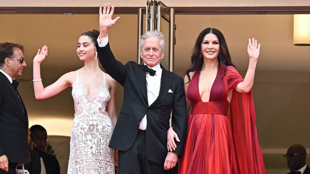 Michael Douglas, Catherine Zeta-Jones, Carys Douglas walk Cannes red