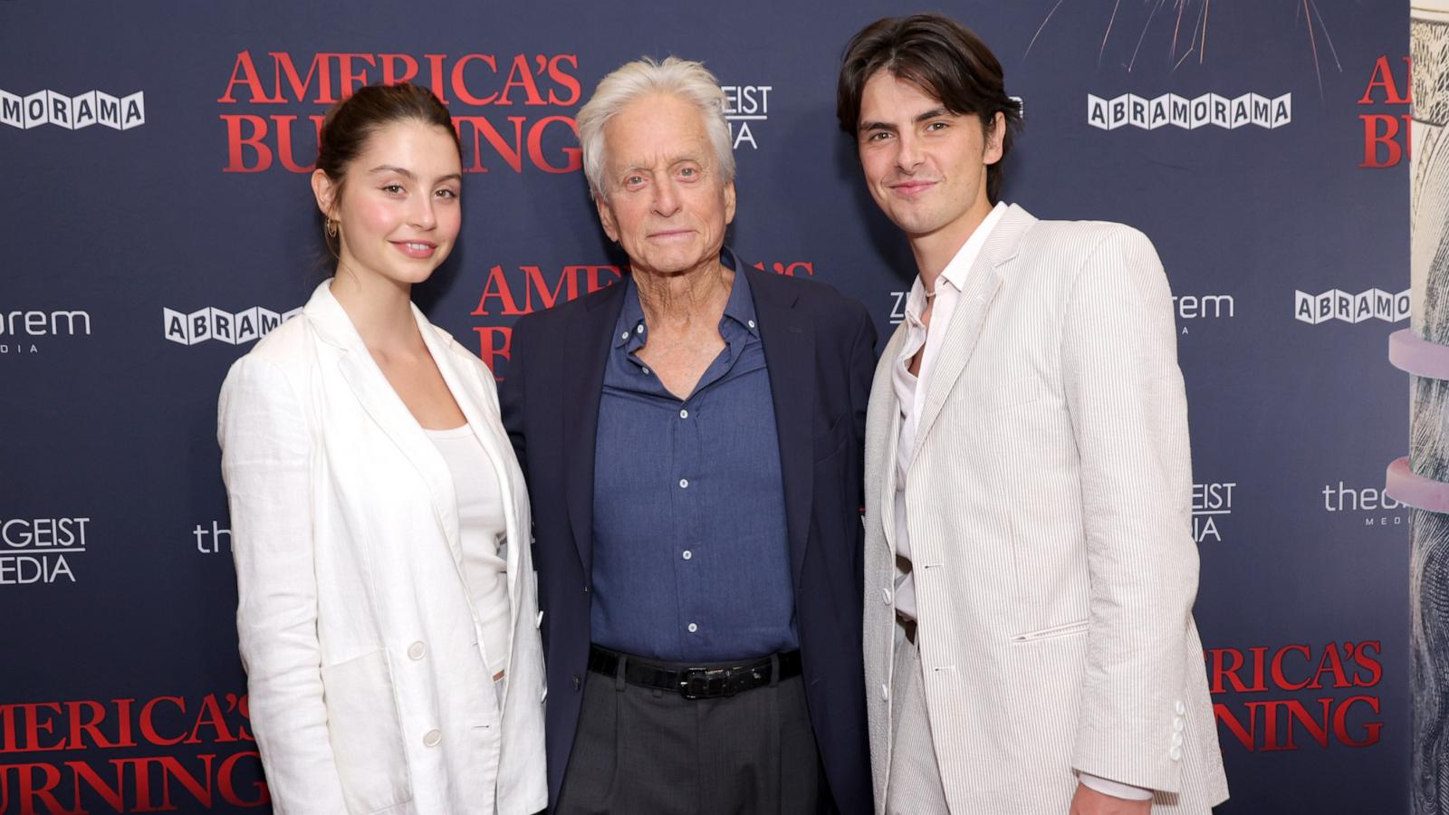 PHOTO: Carys Zeta Douglas, Michael Douglas and Dylan Douglas attend the NY Special Screening of "America's Burning" at DGA Theater on July 10, 2024 in New York City.