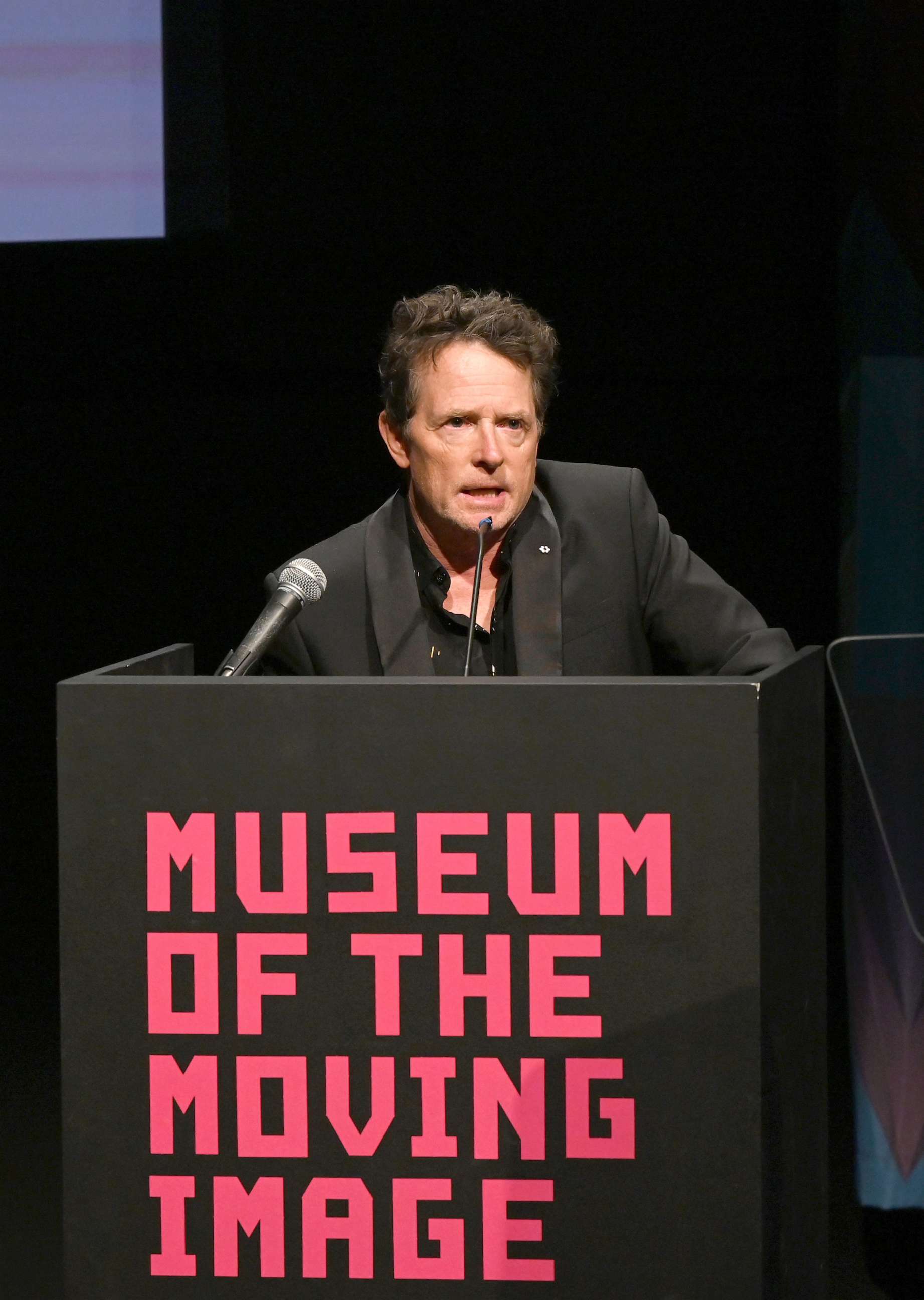 PHOTO: Honoree Michael J. Fox accepts his Lifetime Achievement Award on stage during the Museum of the Moving Image's 2023 Spring Moving Image Awards at Museum of Moving Image on June 06, 2023 in Astoria, New York.