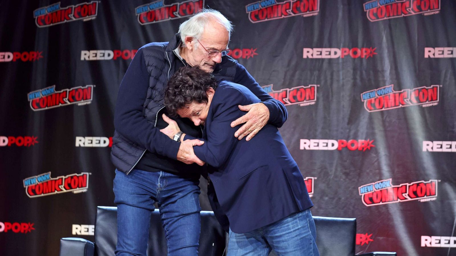 PHOTO: Actors Christopher Lloyd and Michael J. Fox attend a "Back To The Future Reunion" at New York Comic Con on Oct. 8, 2022 in New York City.