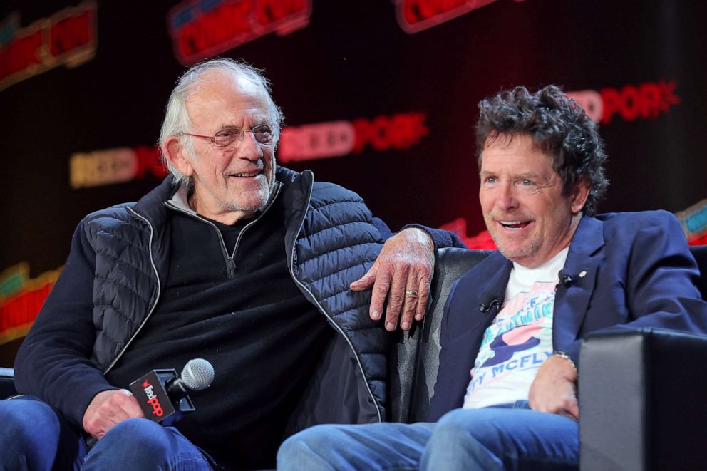 PHOTO: Actors Christopher Lloyd and Michael J. Fox attend a "Back To The Future Reunion" at New York Comic Con on Oct. 8, 2022 in New York City. 