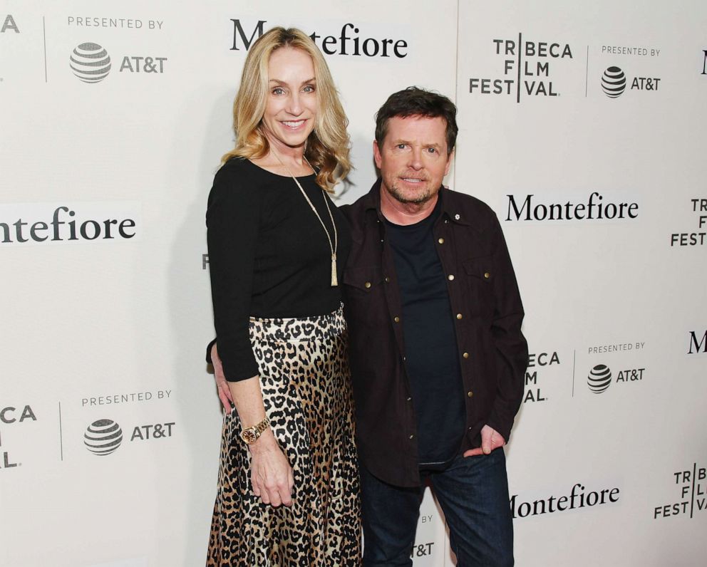 PHOTO: In this April 30, 2019, file photo, Tracy Pollan and Michael J. Fox walk the red carpet for the Tribeca Talks - Storytellers event at the 2019 Tribeca Film Festival in New York.