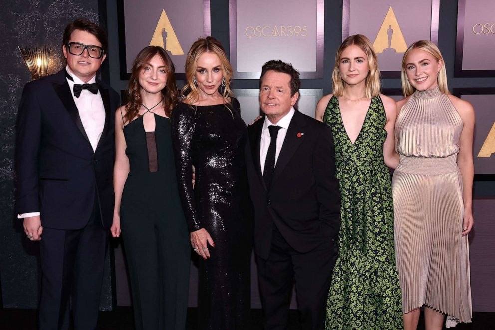 PHOTO: Actor Michael J. Fox, joined by his family Sam Michael Fox, Esme Fox, Tracy Pollan, daughter Aquinnah Fox, and Schuyler Fox, arrives for the Academy of Motion Picture Arts and Sciences' 13th Annual Governors Awards, Nov. 19, 2022, in Los Angeles.