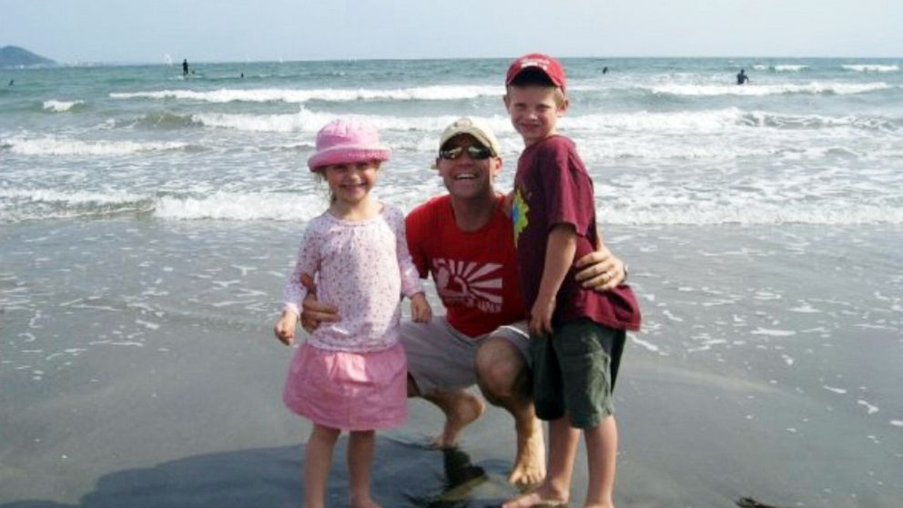 PHOTO: Michael Kasdan poses with his children Lauren and Jacob in an undated family photo.