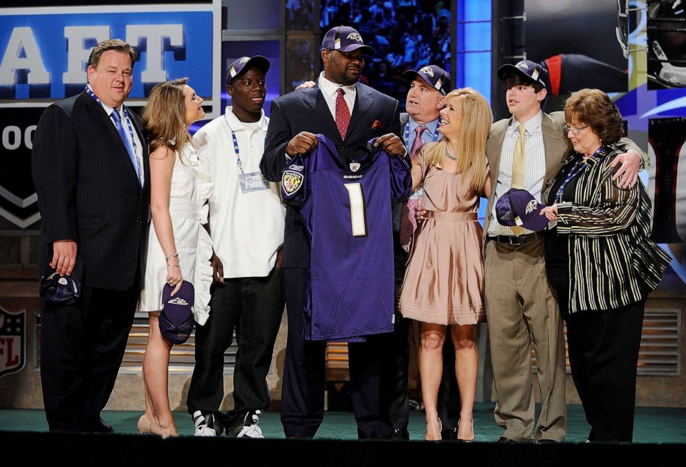 PHOTO: Baltimore Ravens #23 draft pick Michael Oher poses for a photograph with his family at Radio City Music Hall for the 2009 NFL Draft, April 25, 2009 in New York City.