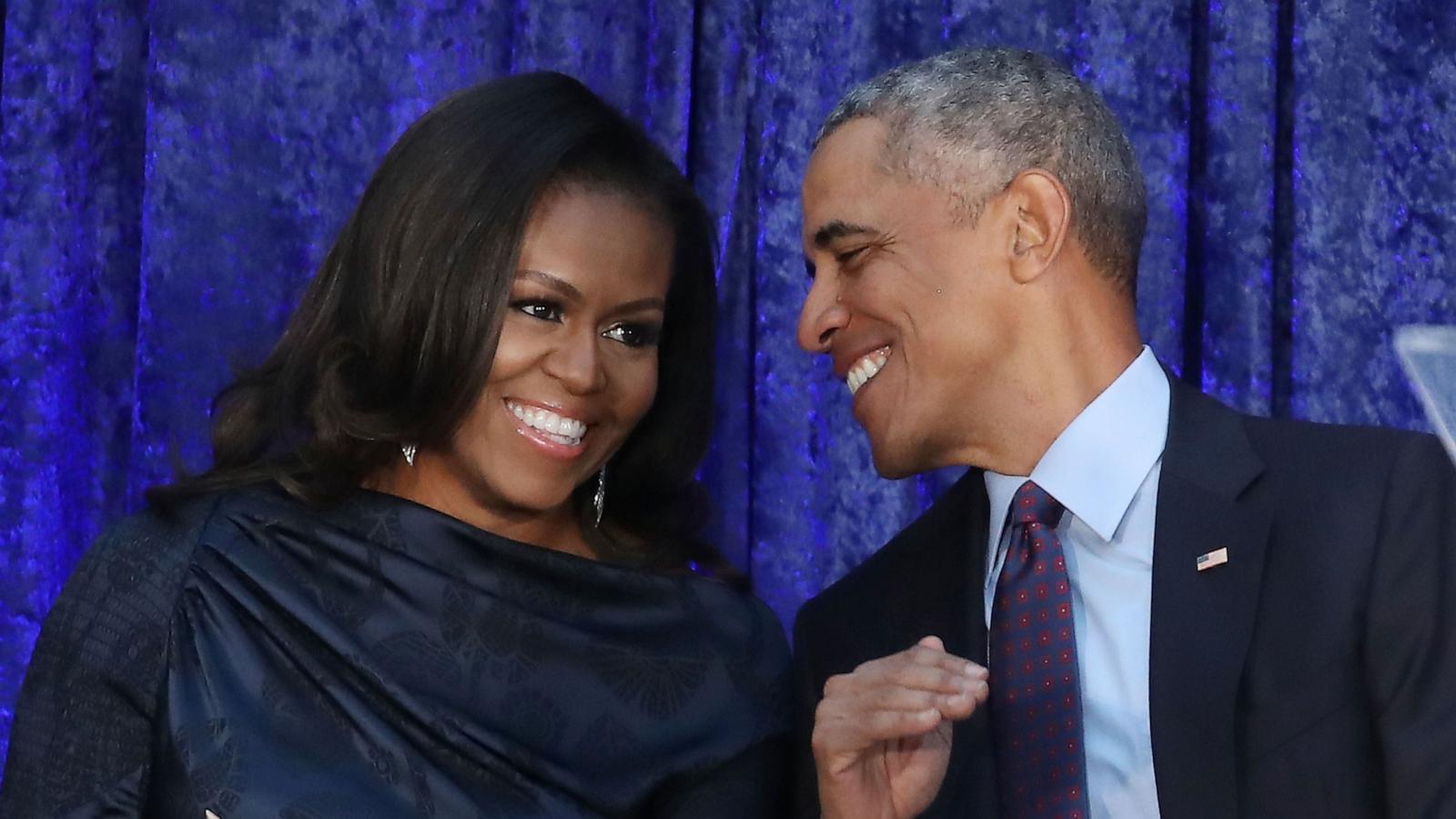 PHOTO: Former President Barack Obama and first lady Michelle Obama participate in the unveiling of their official portraits during a ceremony at the Smithsonian's National Portrait Gallery, on February 12, 2018 in Washington, DC.