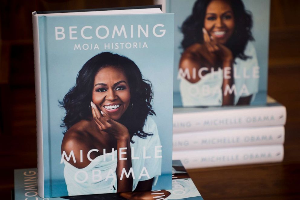 PHOTO: Michelle Obama's memoir 'Becoming' is advertised on the display of Empik bookstore in Krakow, Poland on March 20, 2019.