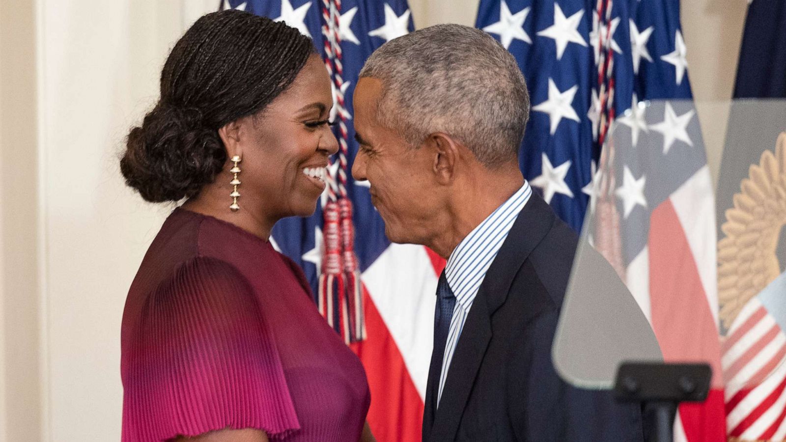 PHOTO: Former First Lady Michelle Obama and former President Barack Obama embrace at a ceremony to unveil their official White House portraits, Sept. 7, 2022 in Washington, DC.