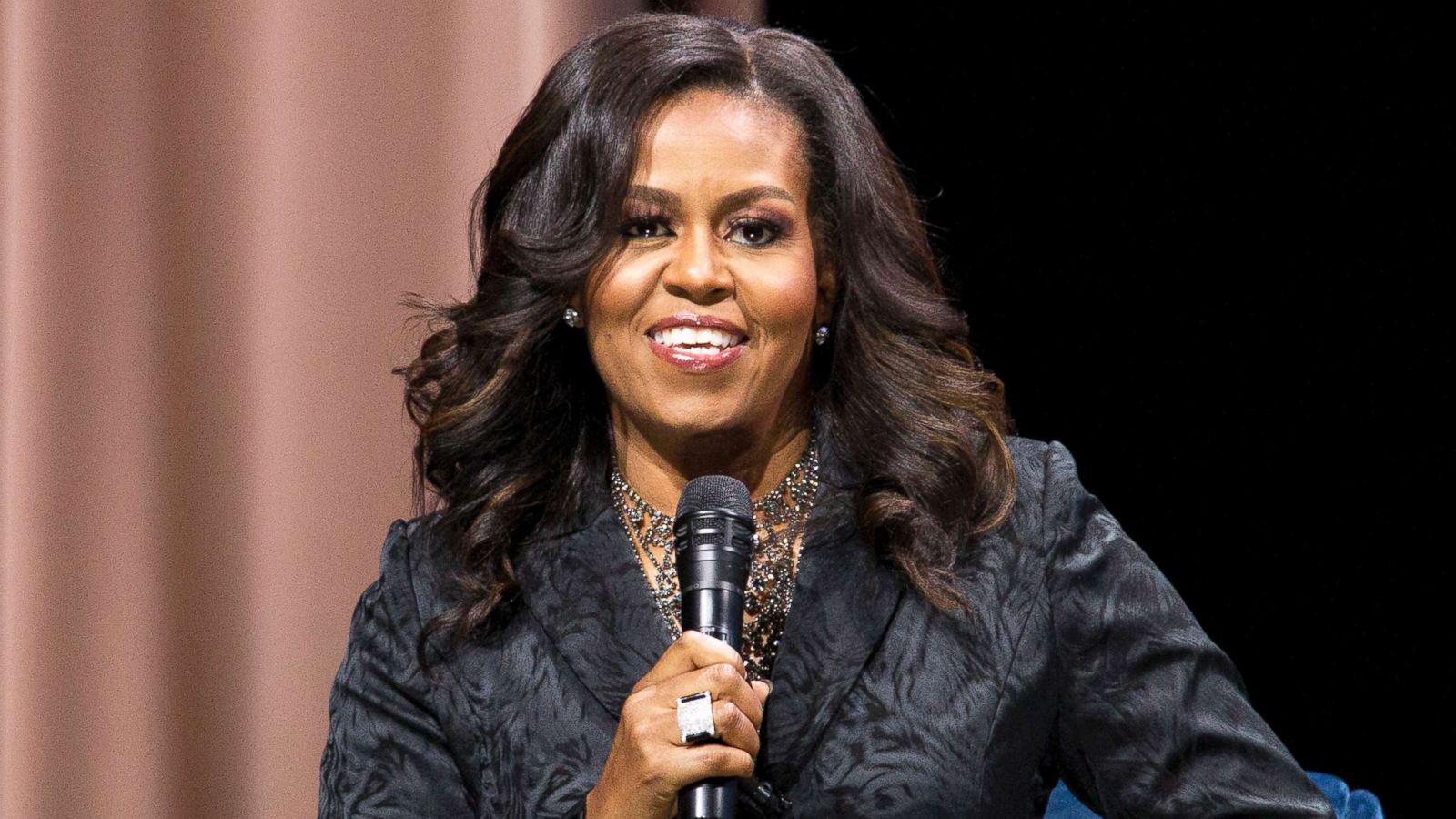 PHOTO: Former first lady Michelle Obama speaks to the audience during a stop on her book tour for "Becoming," in Washington D.C., Nov. 25, 2018.